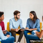 청소년지도사로서의 직업 만족도 - A compassionate youth counselor in a modern community center in Spain, sitting attentively with a di...